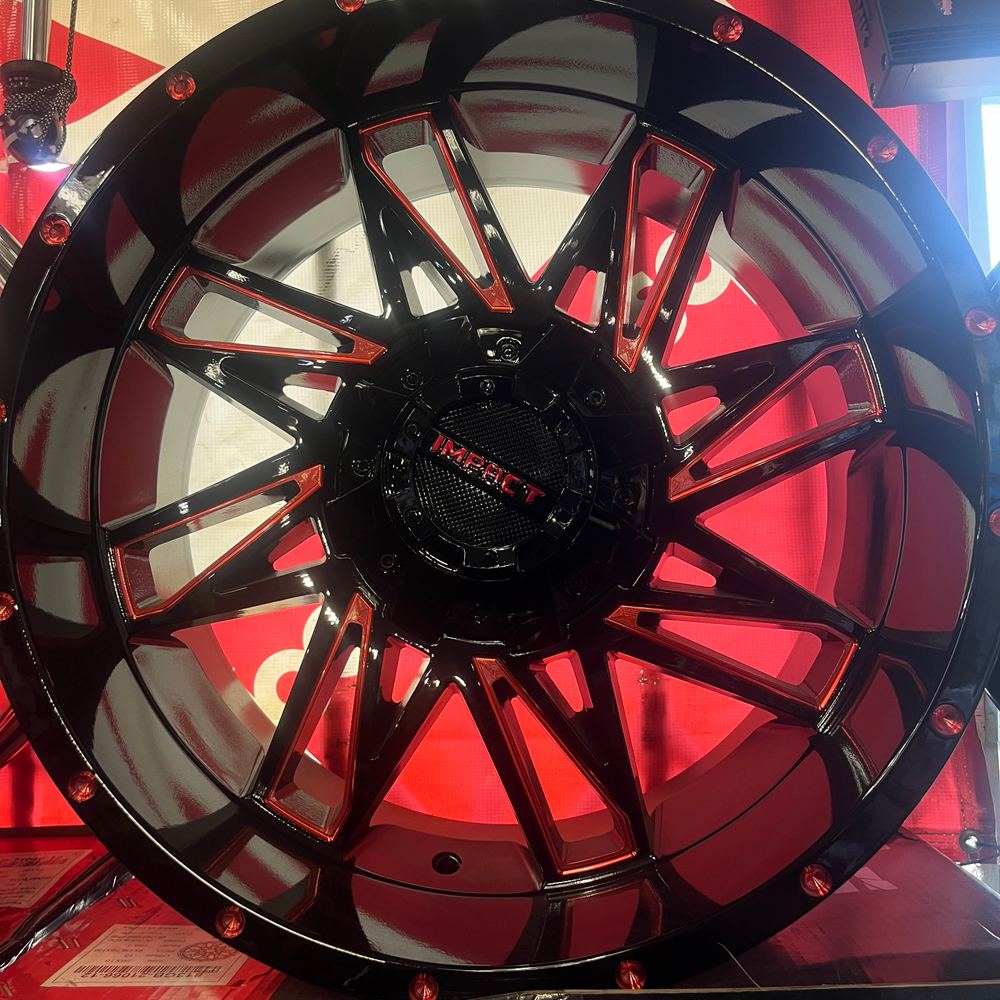 Impact Off-Road wheel, gloss black with red milled spokes